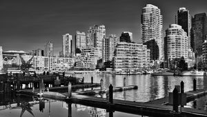 Preview wallpaper city, buildings, pier, black and white