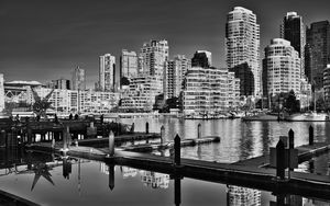 Preview wallpaper city, buildings, pier, black and white
