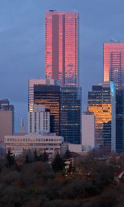 Preview wallpaper city, buildings, reflection, twilight