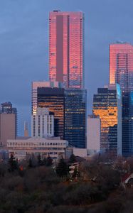 Preview wallpaper city, buildings, reflection, twilight