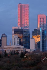 Preview wallpaper city, buildings, reflection, twilight