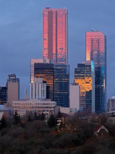 Preview wallpaper city, buildings, reflection, twilight