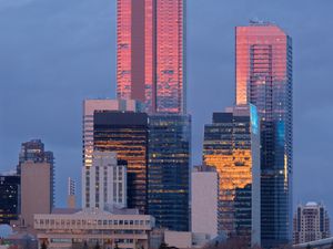 Preview wallpaper city, buildings, reflection, twilight