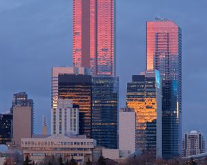 Preview wallpaper city, buildings, reflection, twilight