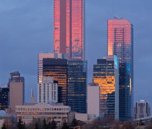 Preview wallpaper city, buildings, reflection, twilight