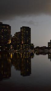 Preview wallpaper city, buildings, reflection, water, twilight