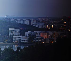 Preview wallpaper city, buildings, river, night, sky, trees, cityscape
