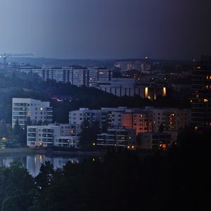 Preview wallpaper city, buildings, river, night, sky, trees, cityscape