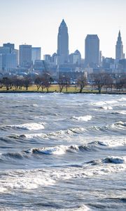 Preview wallpaper city, buildings, river, water, waves, trees