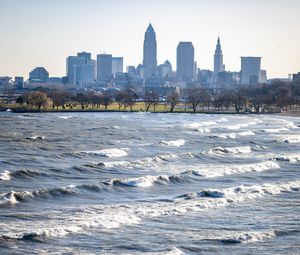 Preview wallpaper city, buildings, river, water, waves, trees