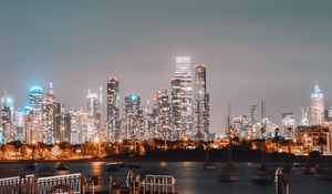 Preview wallpaper city, buildings, river, pier, twilight