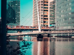 Preview wallpaper city, buildings, river, train, bridge