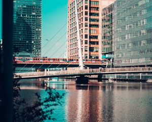 Preview wallpaper city, buildings, river, train, bridge
