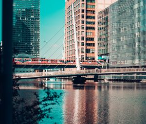 Preview wallpaper city, buildings, river, train, bridge