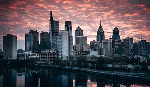 Preview wallpaper city, buildings, river, shore, reflection