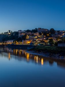 Preview wallpaper city, buildings, river, reflection, twilight