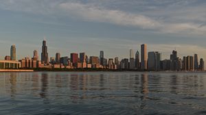 Preview wallpaper city, buildings, river, water, twilight