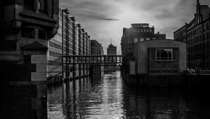 Preview wallpaper city, buildings, river, water, black and white
