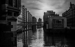 Preview wallpaper city, buildings, river, water, black and white