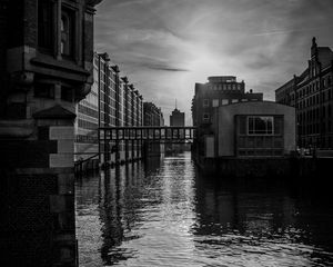 Preview wallpaper city, buildings, river, water, black and white