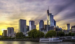 Preview wallpaper city, buildings, river, boat, embankment