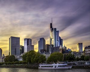 Preview wallpaper city, buildings, river, boat, embankment