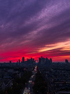 Preview wallpaper city, buildings, road, lights, sunset, evening