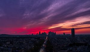 Preview wallpaper city, buildings, road, lights, sunset, evening