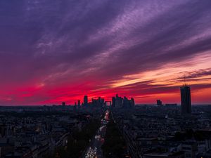 Preview wallpaper city, buildings, road, lights, sunset, evening