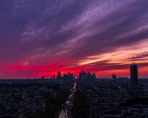 Preview wallpaper city, buildings, road, lights, sunset, evening