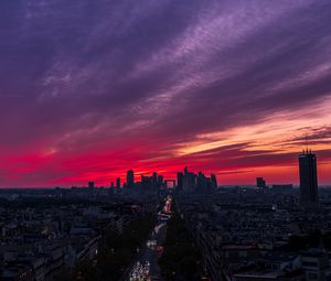 Preview wallpaper city, buildings, road, lights, sunset, evening