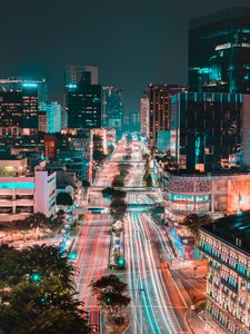 Preview wallpaper city, buildings, road, aerial view, lights, night