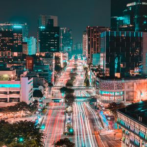 Preview wallpaper city, buildings, road, aerial view, lights, night