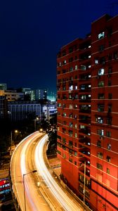 Preview wallpaper city, buildings, road, night, aerial view