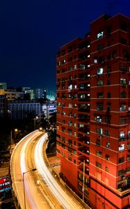 Preview wallpaper city, buildings, road, night, aerial view