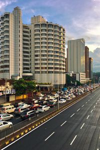 Preview wallpaper city, buildings, road, markings, cars