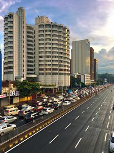 Preview wallpaper city, buildings, road, markings, cars