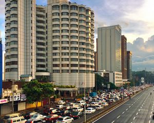 Preview wallpaper city, buildings, road, markings, cars
