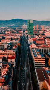 Preview wallpaper city, buildings, road, cityscape, aerial view