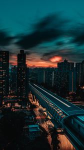 Preview wallpaper city, buildings, road, twilight, aerial view