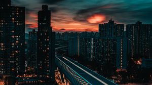 Preview wallpaper city, buildings, road, twilight, aerial view
