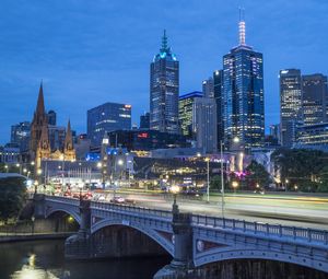 Preview wallpaper city, buildings, road, bridge, lights, twilight