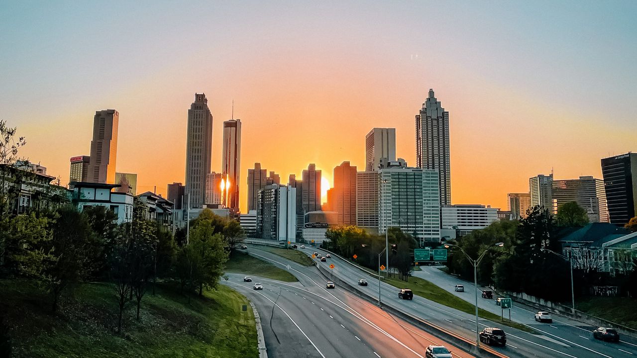 Wallpaper city, buildings, road, cars, sunset