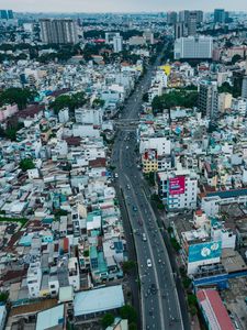 Preview wallpaper city, buildings, road, cityscape, aerial view, metropolis