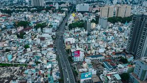 Preview wallpaper city, buildings, road, cityscape, aerial view, metropolis