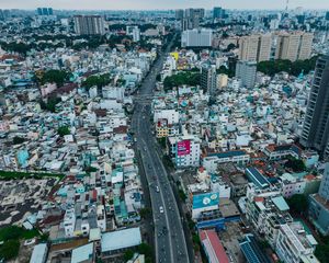 Preview wallpaper city, buildings, road, cityscape, aerial view, metropolis