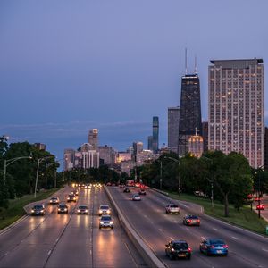 Preview wallpaper city, buildings, road, cars, twilight