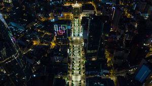 Preview wallpaper city, buildings, road, lights, aerial view, night, dark