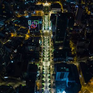 Preview wallpaper city, buildings, road, lights, aerial view, night, dark