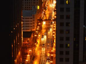 Preview wallpaper city, buildings, road, cars, lights, aerial view, dark